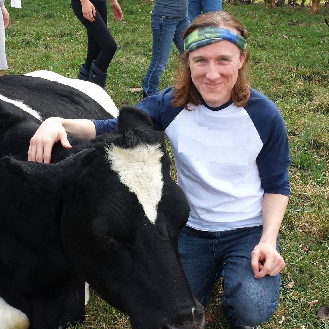 Craig Wescoe with a cow