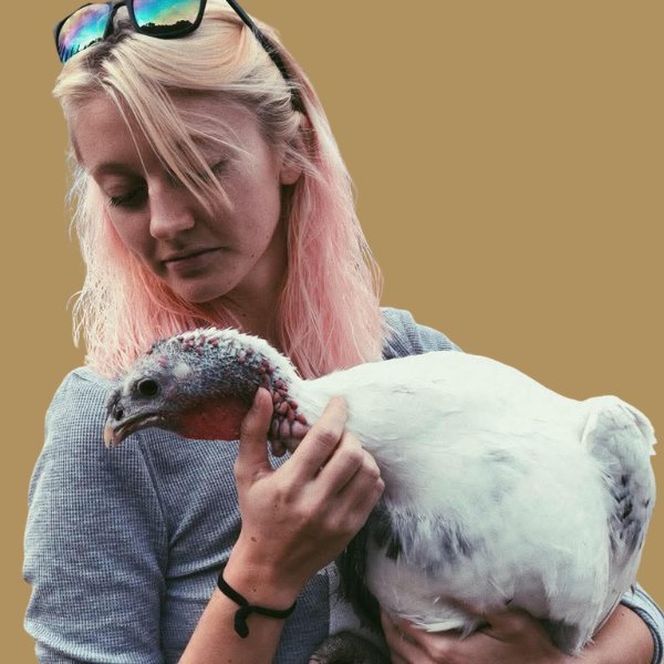 Bailey Jo Hall holding a turkey